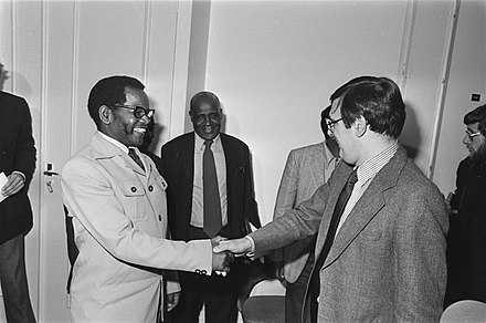 Secretary-General of the African National Congress Oliver Tambo, Treasurer General of the African National Congress Thomas Nkobi and Minister for Development Cooperation Jan Pronk during a meeting at the Ministry of Foreign Affairs on 5 October 1977.