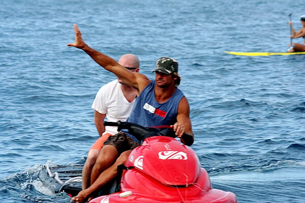 Laird on a personal watercraft at Teahupoʻo