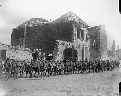 Troops of the 10th (Service) Battalion, Royal Fusiliers halted in Arras, France, before going into action, 9 April 1917. The Battle of Arras, April-may 1917 Q5112.jpg