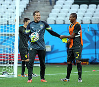 Júlio César (left) and Fernandinho (right) training for Brazil at 2014 FIFA World Cup