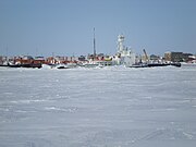 Northern Transportation Company Limited tug and barges overwintering in Cambridge Bay after the annual sealift