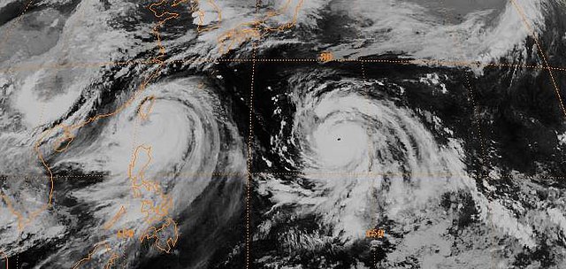 Satellite image of Typhoons Andy (left) and Bess (right) at 1500 UTC on July 28.