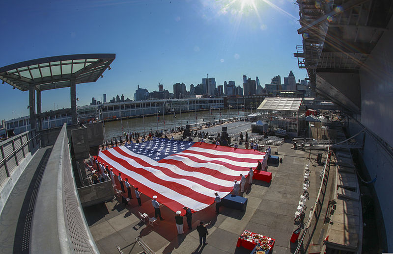 File:U.S. Service members and veterans gather around a U.S. flag during a Memorial Day celebration at the Intrepid Sea, Air and Space Museum in New York May 27, 2013 130527-M-DO926-002.jpg