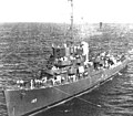 USS Riddle (DE-185) passing a line to another ship, circa in 1944.jpg