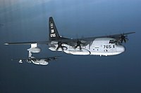 US Navy 070205-M-3968C-119 Two KC-130J Hercules aircraft, assigned to Marine Aerial Refueler Transport Squadron (VMGR) 352, stagger themselves during a refueling training exercise off the coast of Southern California.jpg