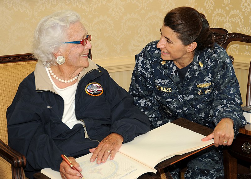 File:US Navy 100715-N-6936G-023 Former First Lady Barbara Bush signs the guest book aboard the aircraft carrier USS George H.W. Bush (CVN 77) while Lt. Cmdr. Virginia Schmied looks on.jpg