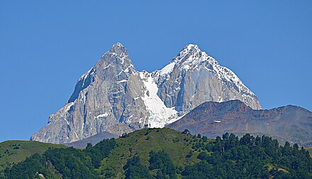 Гора часто. Ушба из Местии гора. Ушба фото. Гора с двойной вершиной. Ушба HD.