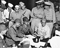 Shigematsu Sakaibara signing the surrender of Wake Island Aboard USS Levy—September 4, 1945.