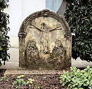 Upper part of a wayside shrine (1718) depicting a crucifixion scene in Trier-Zewen, Germany.