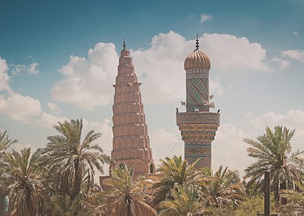 A view of the Mausoleum of Umar Suhrawardi, with its leaning conical tower.