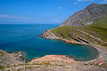 English: Kardamos beach, Imbros/Gökçeada island, Turkey. Ελληνικά: Παραλία Κάρδαμος, Ίμβρος νήσος, Τουρκία. Στο βάθος φαίνεται η ερειπωμένη Ελληνική εκκλησία.