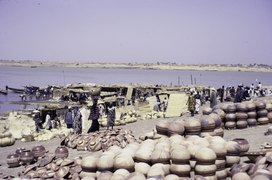 A crowd at a pottery market on the bank of the Niger River, Mopti, Mali, 1972.