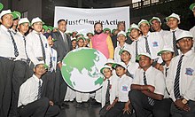 Schoolchildren pose with Minister of State for Environment and Climate Change Shri Prakash Javadekar in New Delhi. A group of select school children presenting a symbolic Globe as best wishes, to the Minister of State for Environment, Forest and Climate Change (Independent Charge), Shri Prakash Javadekar, in New Delhi. The Secretary.jpg