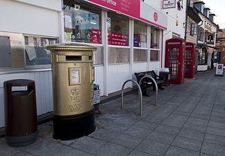 Alcester gold post box street