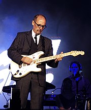 Fairweather Low with Roger Waters at Roskilde Festival, Denmark in 2006. Andy Fairweather-Low, July 02 2006.jpg