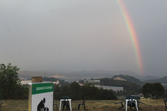 A rainbow imaged from Castellgalí after heavy rain over Castellet mountain, Castellgalí, Barcelona province