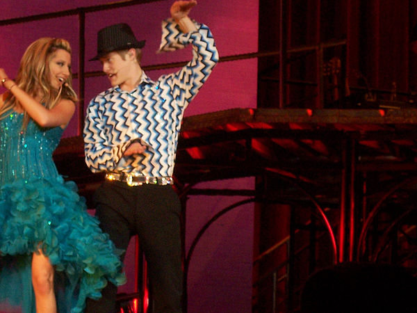 Tisdale and Grabeel performing "Bop to the Top" during the show in Rochester