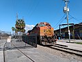 2 BNSF C44-9W locomotives lead this manifest, but are waiting for clearance before it can proceed.