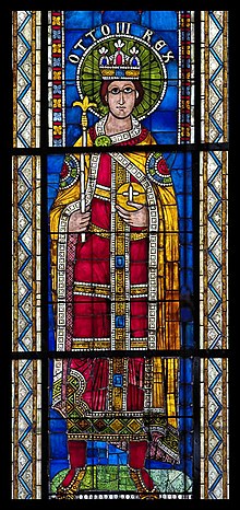 Depiction of Otto III (standing next to the portraits of Otto I, Otto II and Konrad II), part of the so-called "Emperor windows" (Links to the images on Wiki Commons), that depicting nineteen Holy Roman Emperors and dating from the 12th century (restored during the 14th century). Bas-cote nord, baie VI Otto III Rex (dernier tiers XIIe).jpg