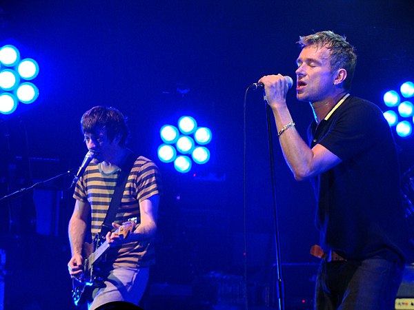 Coxon (left) and Albarn (right) on stage at the Newcastle Academy in June 2009