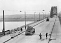 Tanks of British XXX Corps cross the road bridge at Nijmegen during its capture, Sep 1944