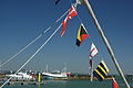 Bunting up at Yarmouth Harbour, Yarmouth, Isle of Wight during the Old Gaffers Festival 2012.