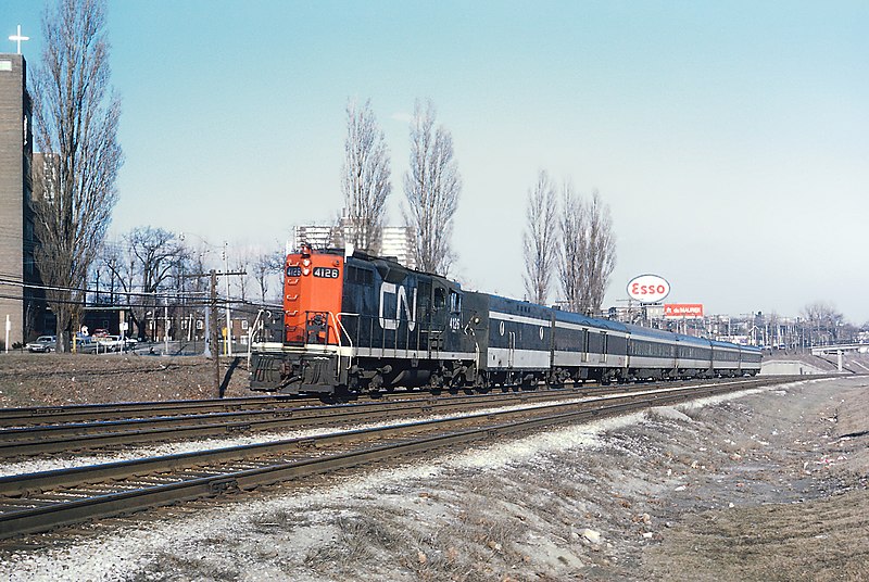 File:CN GP9 4126 with a extra passenger train near old Sunnyside station, Toronto, ON on April 3, 1970 (34886478264).jpg