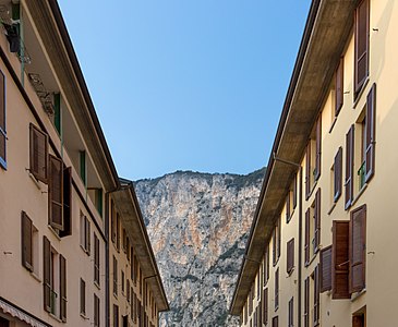 Residential buildings with cliffs in background