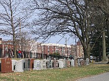 Cemetery and apartment houses along Commonwealth Avenue, Brighton, near Chandler's Pond Cemetery in Brighton Boston.jpg