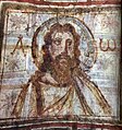 Mural painting from the catacomb of Commodilla. Bust of Christ, (one of the first bearded images of Christ) with alpha and omega. Late 4th century