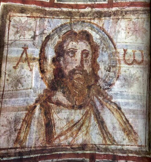 A mural painting from the catacomb of Commodilla. One of the first bearded images of Jesus, late 4th century.