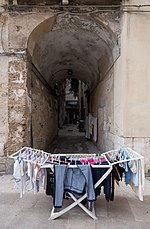 Clothes horse on an old street, Bari, Italy (PPL1-Corrected) (approx. GPS location) julesvernex2.jpg
