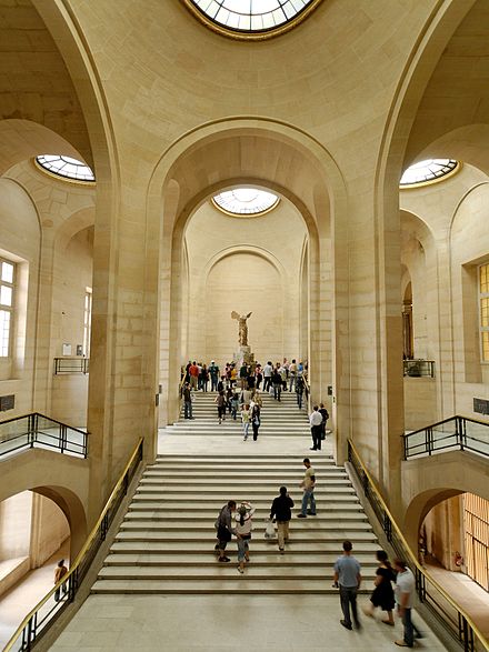The Louvre's monumental Escalier Daru, topped by the Winged Victory of Samothrace, took its current appearance in the early 1930s.