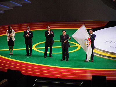 Handing off the East Asian games flag EAG2009 closing11.JPG