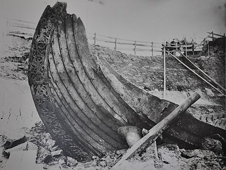 Excavation of a complete Viking ship from year 834 in the Oseberg burial mound, near Tønsberg, Norway. The restored ship is on display in Oslo.