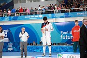 Deutsch: Fechten bei den Olympischen Jugend-Sommerspielen 2018: Tag 1, 7. Oktober 2018, Jungen, Säbel, Siegerehrung - Gold: Krisztián Rabb (HUN), Silber: Hyun Jun (KOR), Bronze: Mazen Elaraby (EGY); Medaillen überreicht durch IOC-Mitglied Britta Heidemann, Maskottchen überreicht durch FIE-Generalsekretär Emmanuel Katsiadakis English: Fencing at the 2018 Summer Youth Olympics at 7 October 2018 – Boys' sabre Medal ceremony – Gold: Krisztián Rabb (HUN), Silver: Hyun Jun (KOR), Bronze: Mazen Elaraby (EGY); Medal presenter: IOC member Britta Heidemann, Mascot presenter: FIE Secretary General Emmanuel Katsiadakis