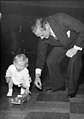 Ford-Chief-Director-Otto-Brondum-inaugurating-a-Ford-child-to-the-motoring-art-391772841147.jpg
