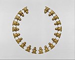 Aztec or Mixtec frog ornament necklace from the Metropolitan Museum of Art, 15-16th cent. Frogs are associated with the earth. Frog Necklace Ornaments.jpg