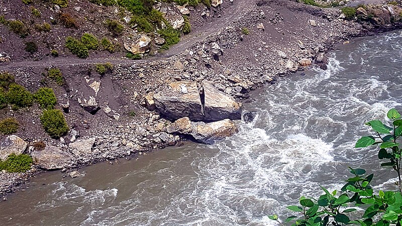 File:Glaciers melting water crushing big stone.jpg