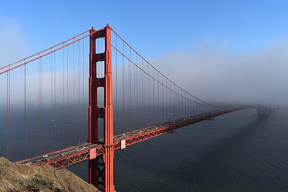 Golden Gate Bridge in fog and evening sun