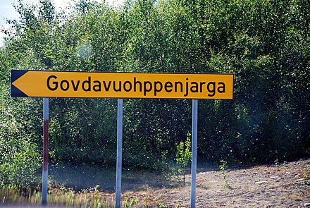 Directional road sign in Sámi, Kautokeino district.