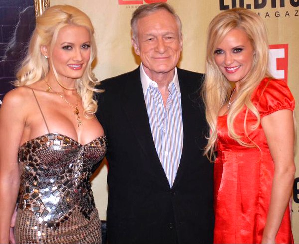 Hefner with his partners Holly Madison (left) and Bridget Marquardt, 2007