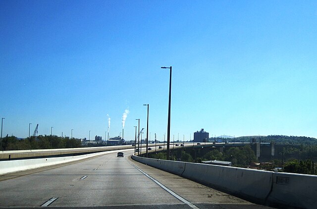 Curtis Creek Drawbridges as seen from I-695 outer; the center of the bascule bridge marks mile marker 0.0. In the distance at top right is the Francis