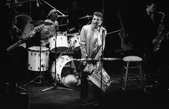 Left to right: Norman Watt-Roy (bass), Charley Charles (drums), Ian Dury (vocals) and Davey Payne (saxophone)