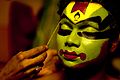 Kathakali dancer in the make up room. (16762327612).jpg