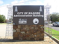 Kilgore City Hall sign evokes the importance of oil to the city's history. Kilgore, TX, City Hall sign IMG 5927.JPG