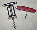 Corkscrew with additional screw and Swiss-knife corkscrew