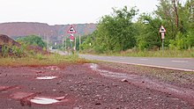 Red-colored ground is common because of the iron oxides.