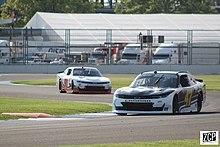 Weatherman racing Preston Pardus (No. 90) at the Indianapolis Road Course in 2021 Kyle weatherman (51382011967).jpg