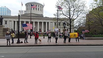 Protesters in front of the Ohio Statehouse on May 1, 2020 May 1, 2020 Ohio Anti-COVID-19 Lock-down Protest.jpg